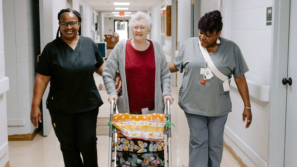 Staff with Patient at Ouachita Nursing and Rehab Center